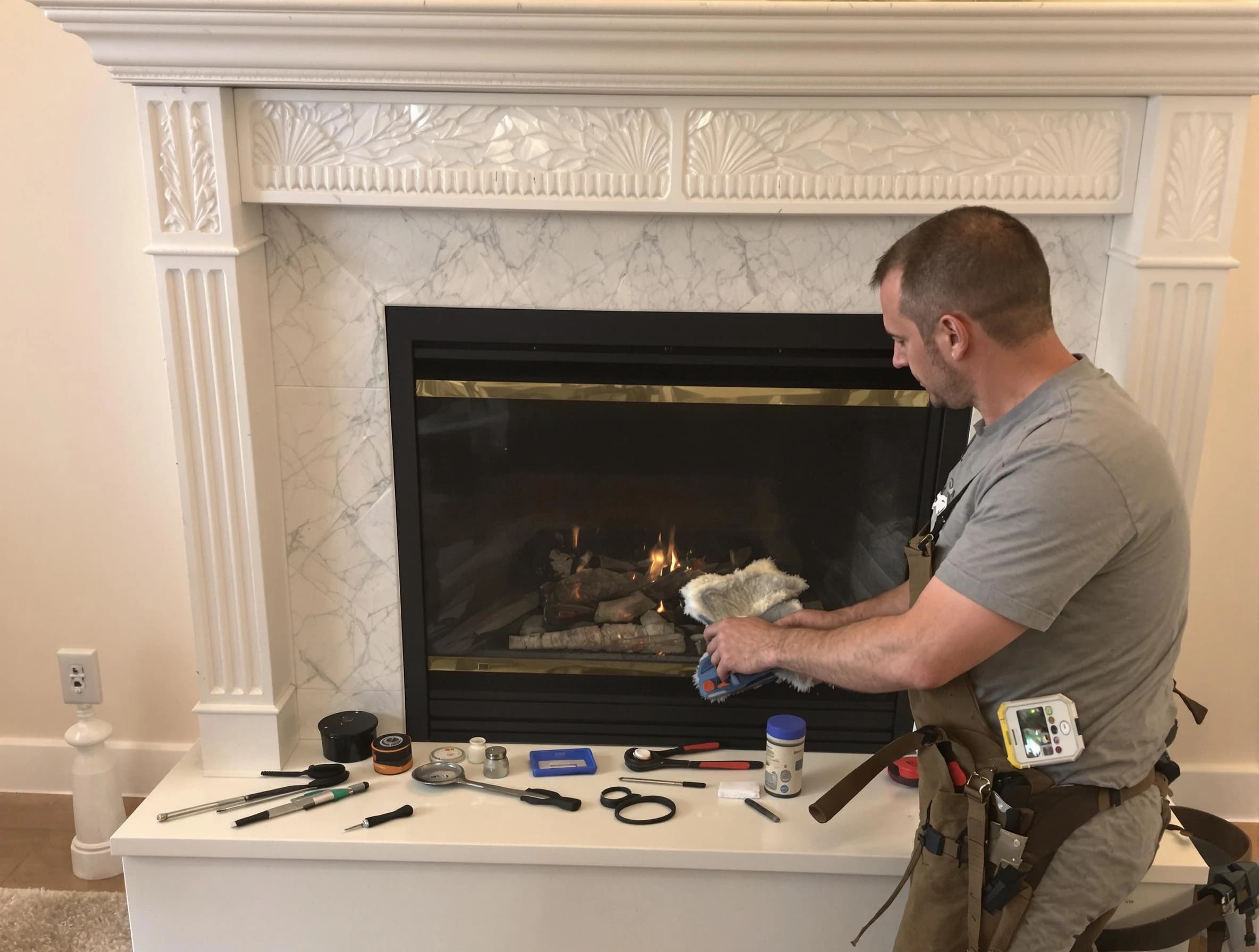 North Huntingdon Chimney Sweep performing fireplace maintenance in North Huntingdon, PA